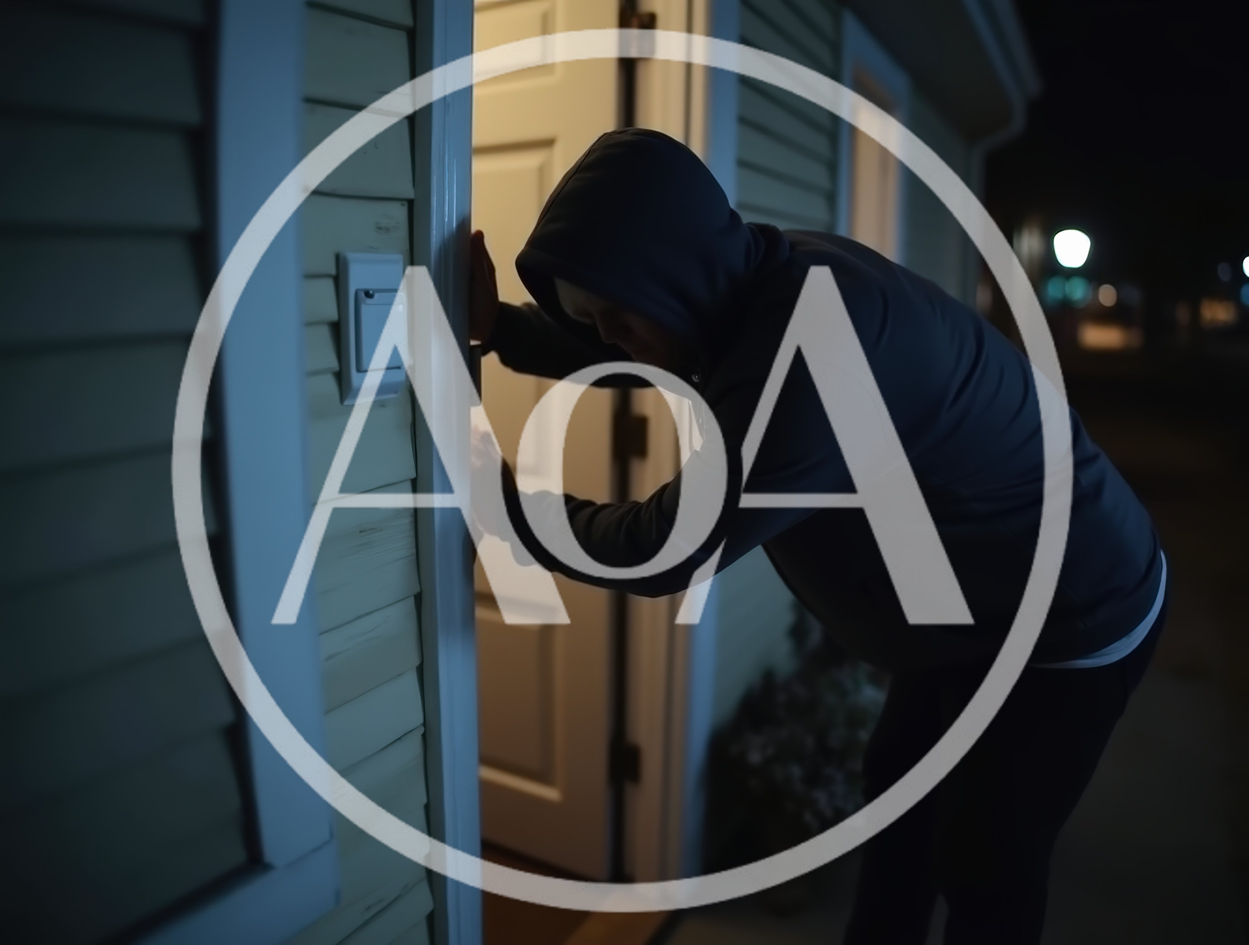 Intruder Wearing Hoodie Attempting To Break Into House