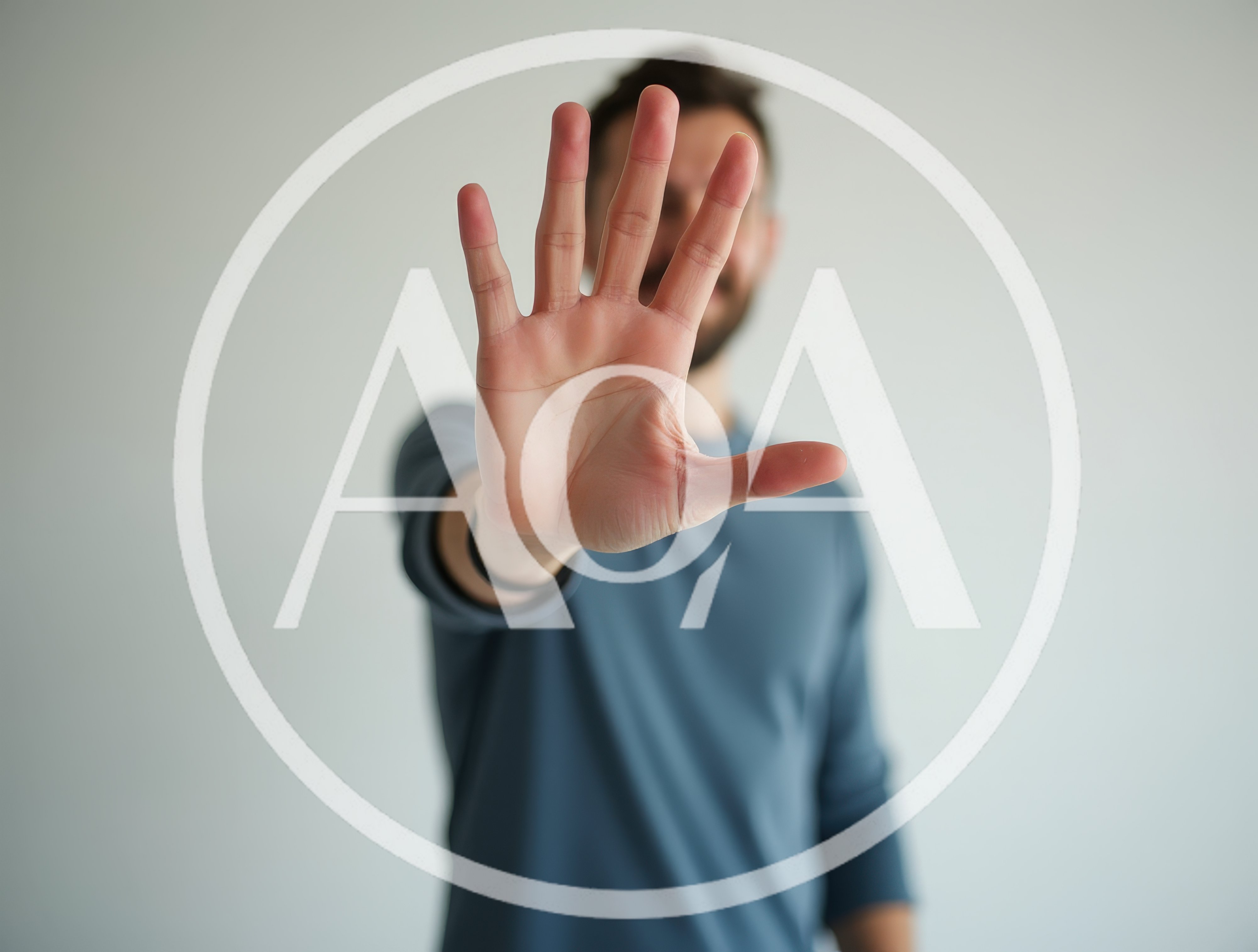 Man Holding Hand Up In Stop Gesture