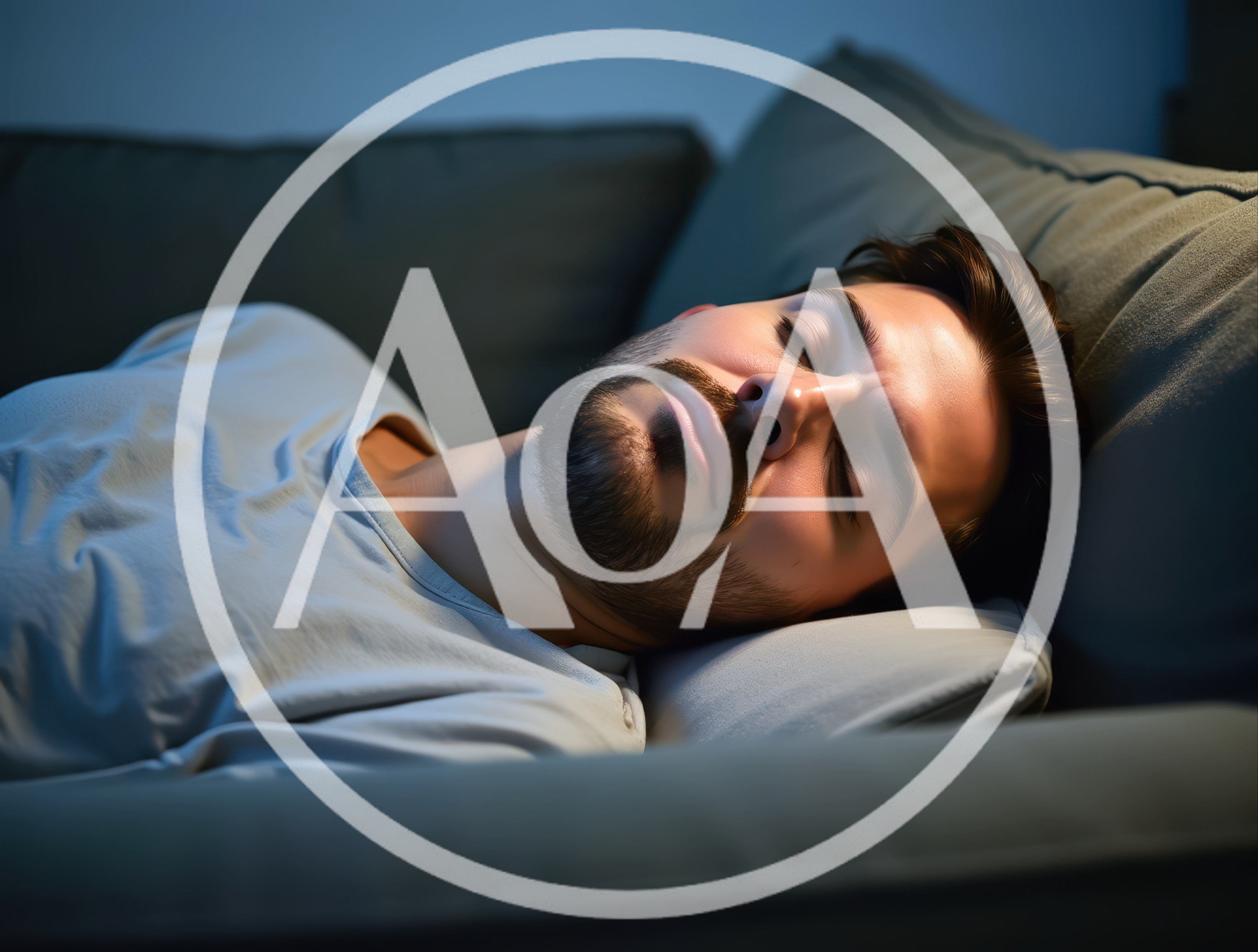 Young Man Sleeping Peacefully On A Sofa