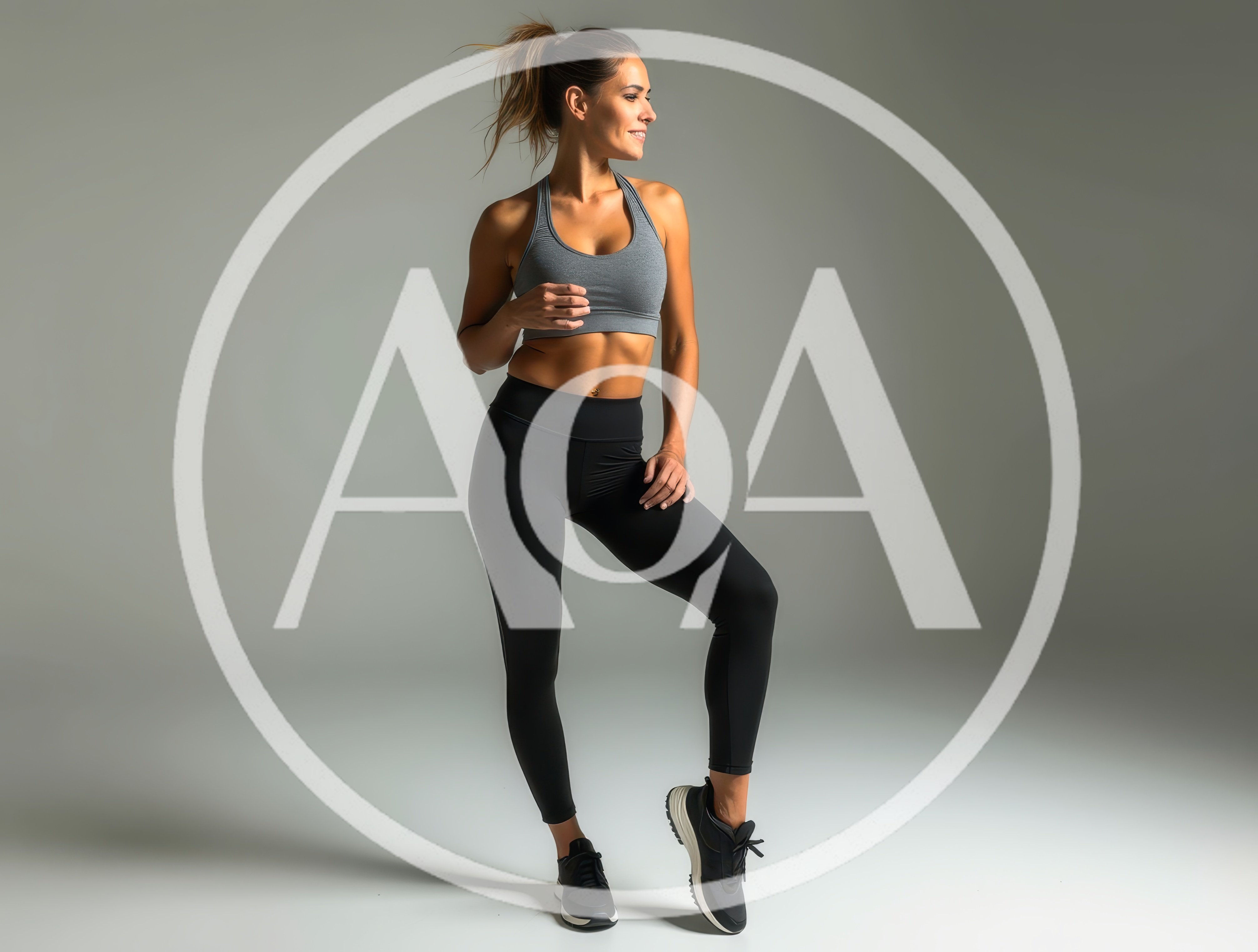 Fit Woman Posing In Sportswear Against Grey Background