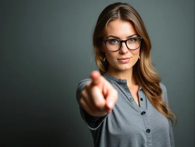 Professional Woman Pointing Directly At The Camera