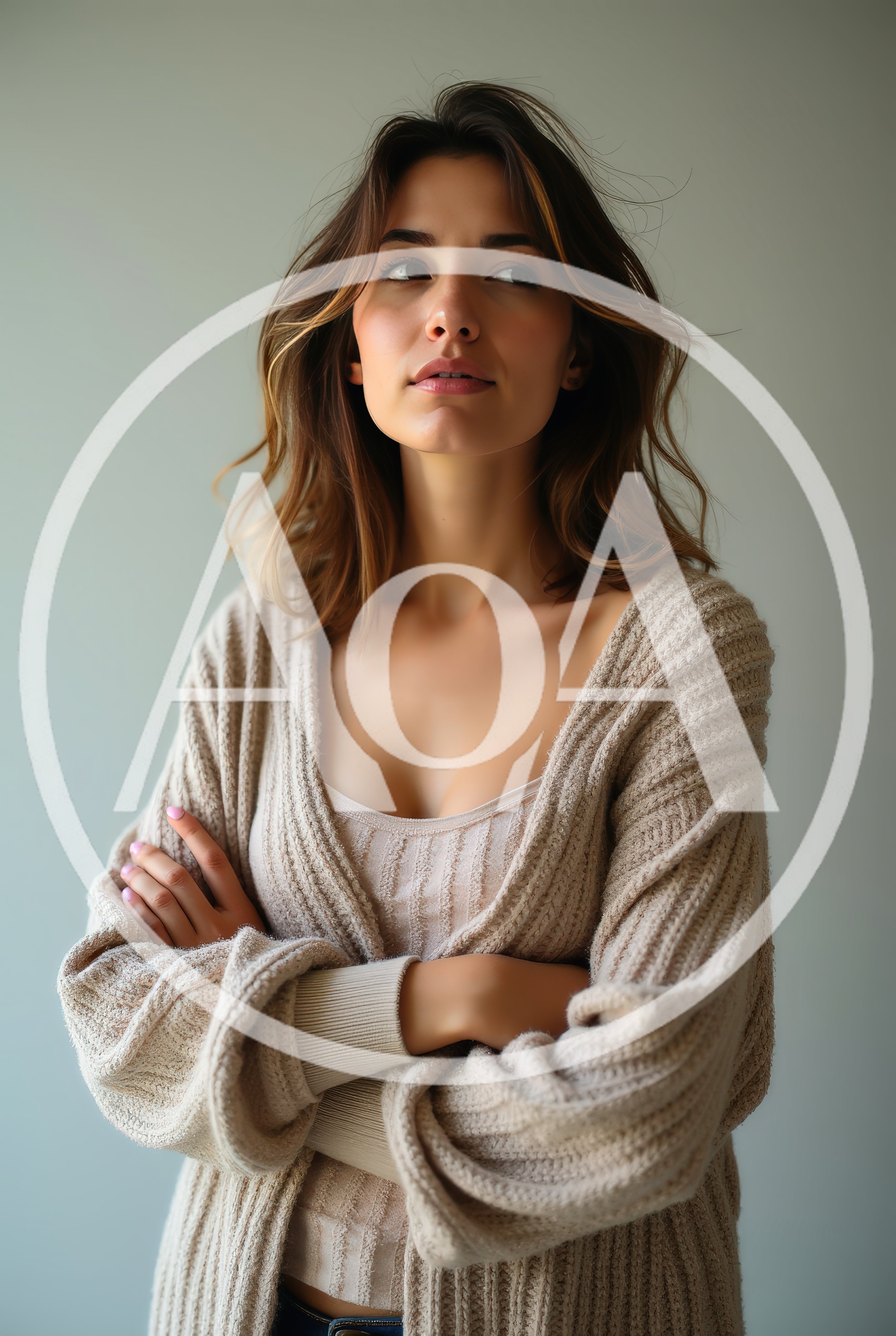 Young Woman Posing With Arms Crossed In Cardigan