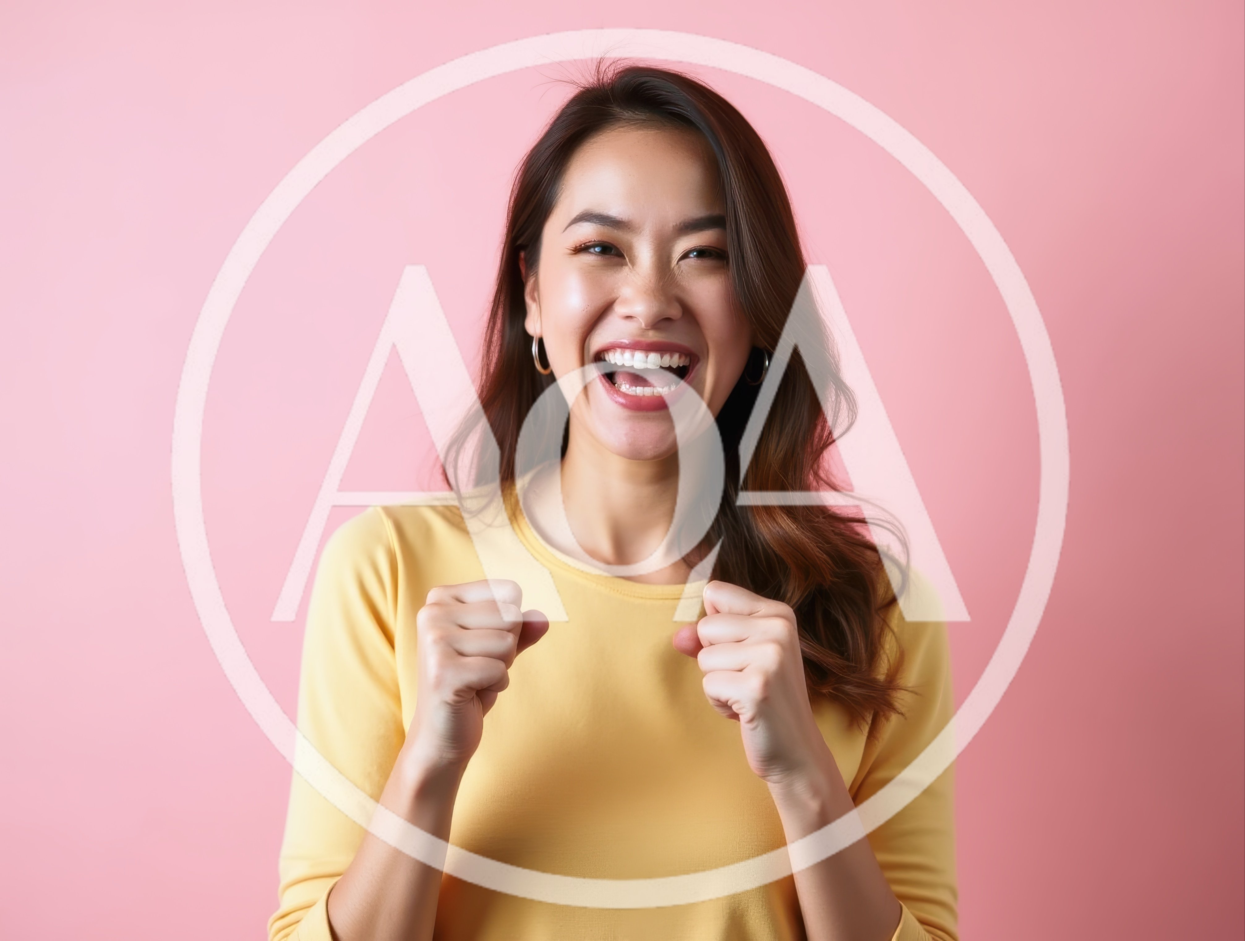 Excited Young Asian Woman Celebrating Success