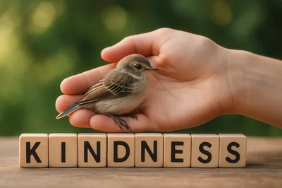 Small Bird Resting Gently In A Human Hand
