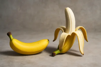 Whole And Peeled Bananas On A Neutral Background