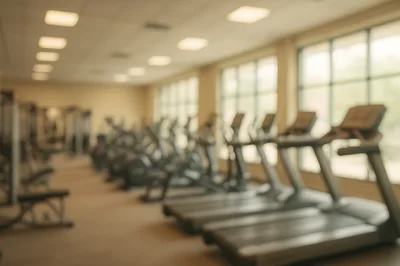 Blurred Interior View of Modern Fitness Center Gym