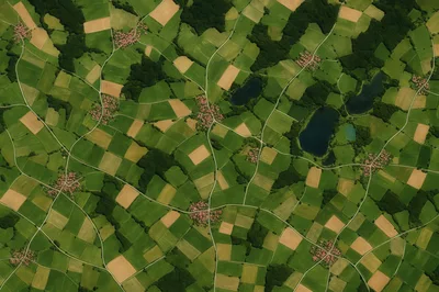 Aerial View Of Rural European Farmland And Villages