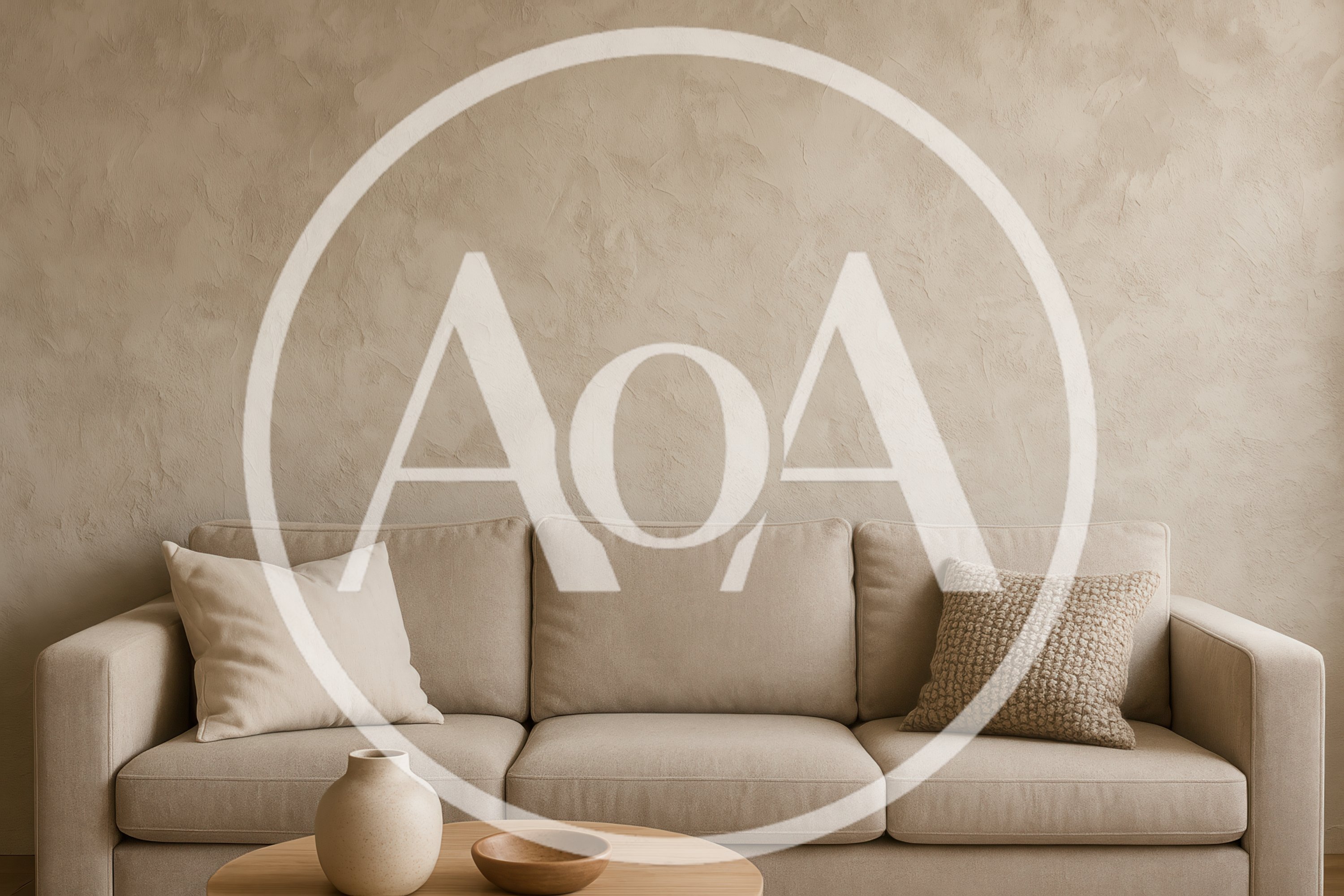 Minimalist Living Room With Beige Sofa And Textured Wall
