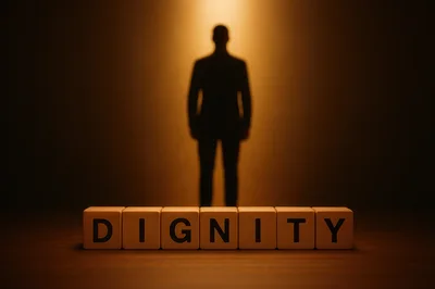 Wooden Blocks Spelling Dignity With Silhouette Of A Man