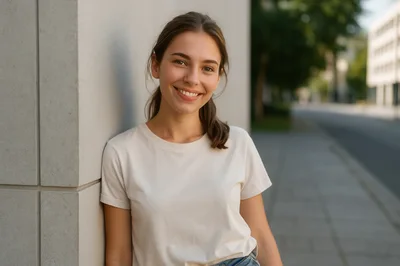 Smiling Young Woman Leaning Against A Concrete Wall