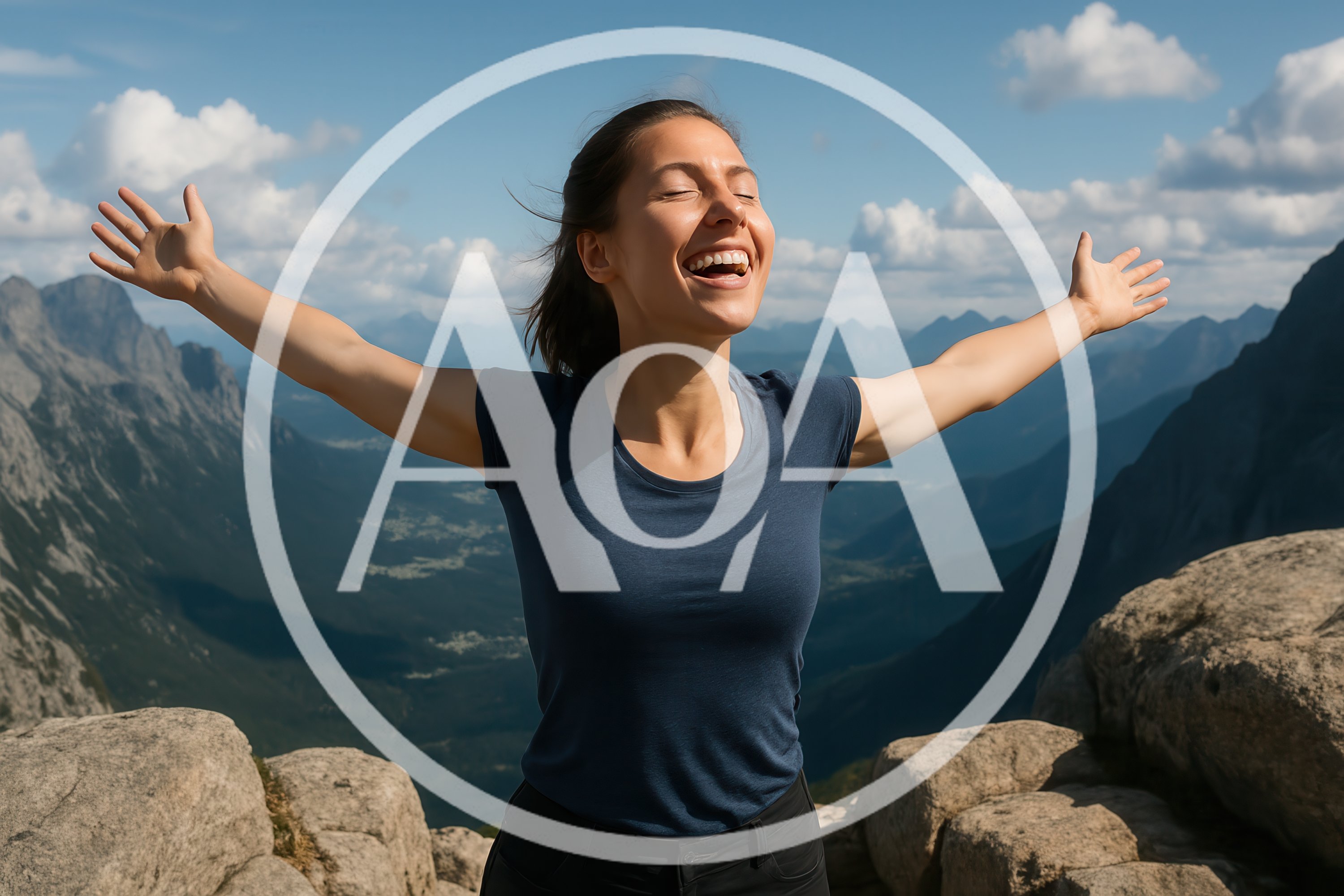 Happy Woman Standing With Arms Outstretched On Mountain Peak