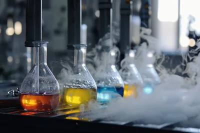 Laboratory Glass Flasks With Colorful Chemical Reactions