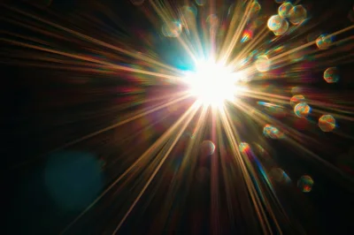 Abstract Light Burst With Colorful Lens Flare Effects