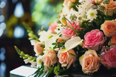 Elegant Floral Arrangement With Pink And Peach Roses