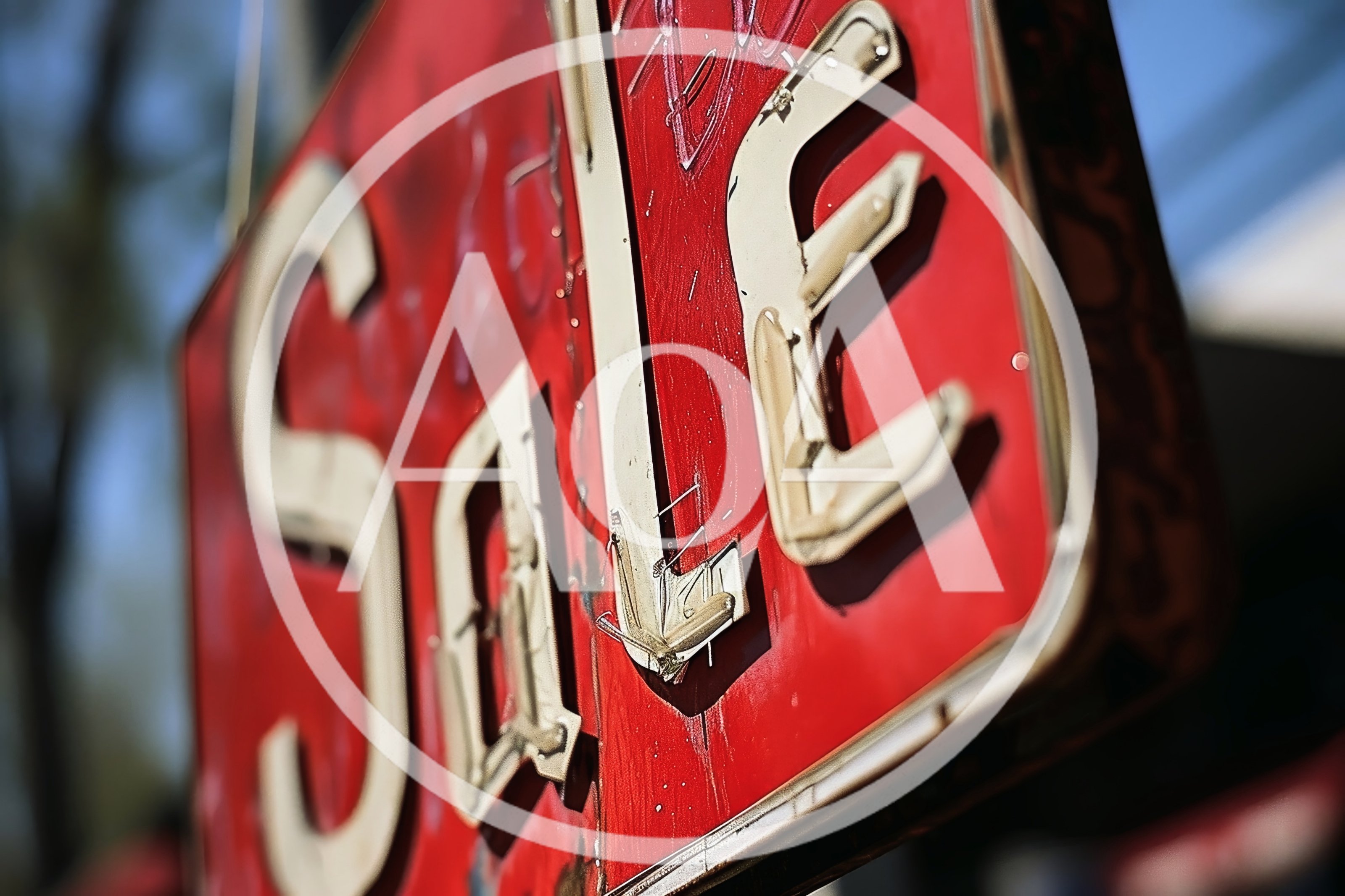 Close Up Of A Vintage Red Sale Sign