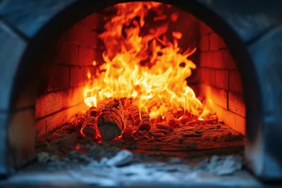 Wood Fired Oven With Burning Logs