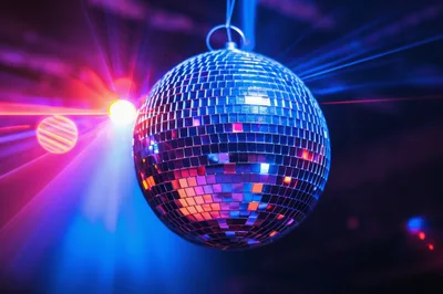 Shiny Disco Ball Rotating In A Nightclub