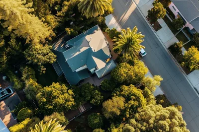 Aerial View Of A Suburban House In A Neighborhood