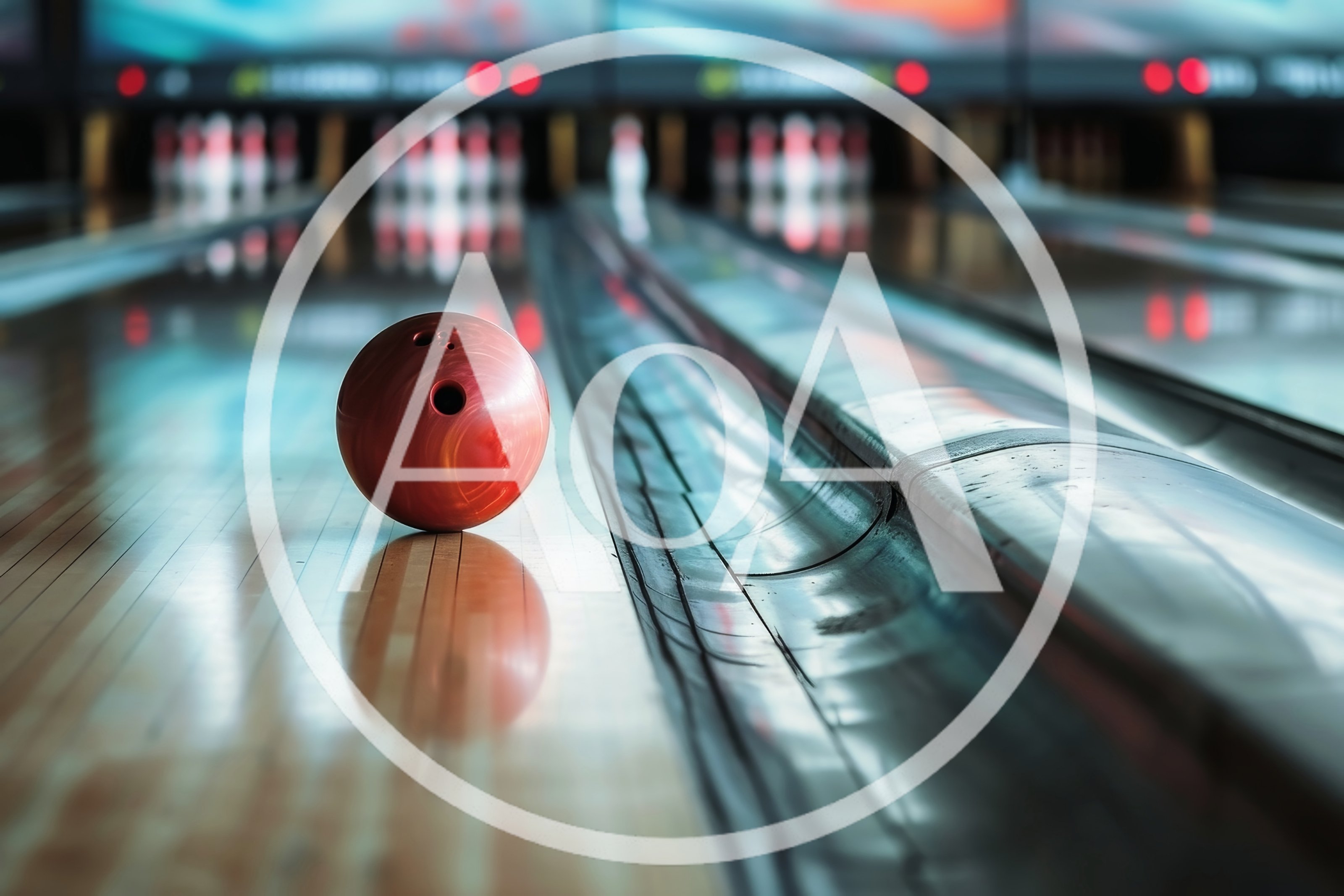 Red Bowling Ball Resting on a Polished Wooden Lane