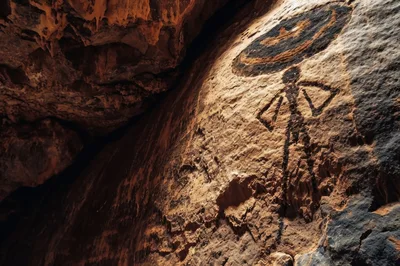 Ancient Petroglyph Carving On A Sandstone Cave Wall