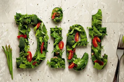 Diet Word Formed With Fresh Salad Vegetables