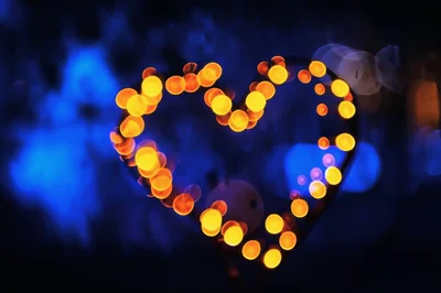 Glowing Heart Shape Made Of Bokeh Lights