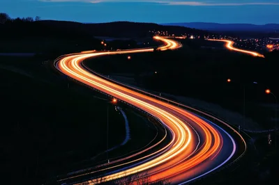 Long Exposure Light Trails On A Winding Highway