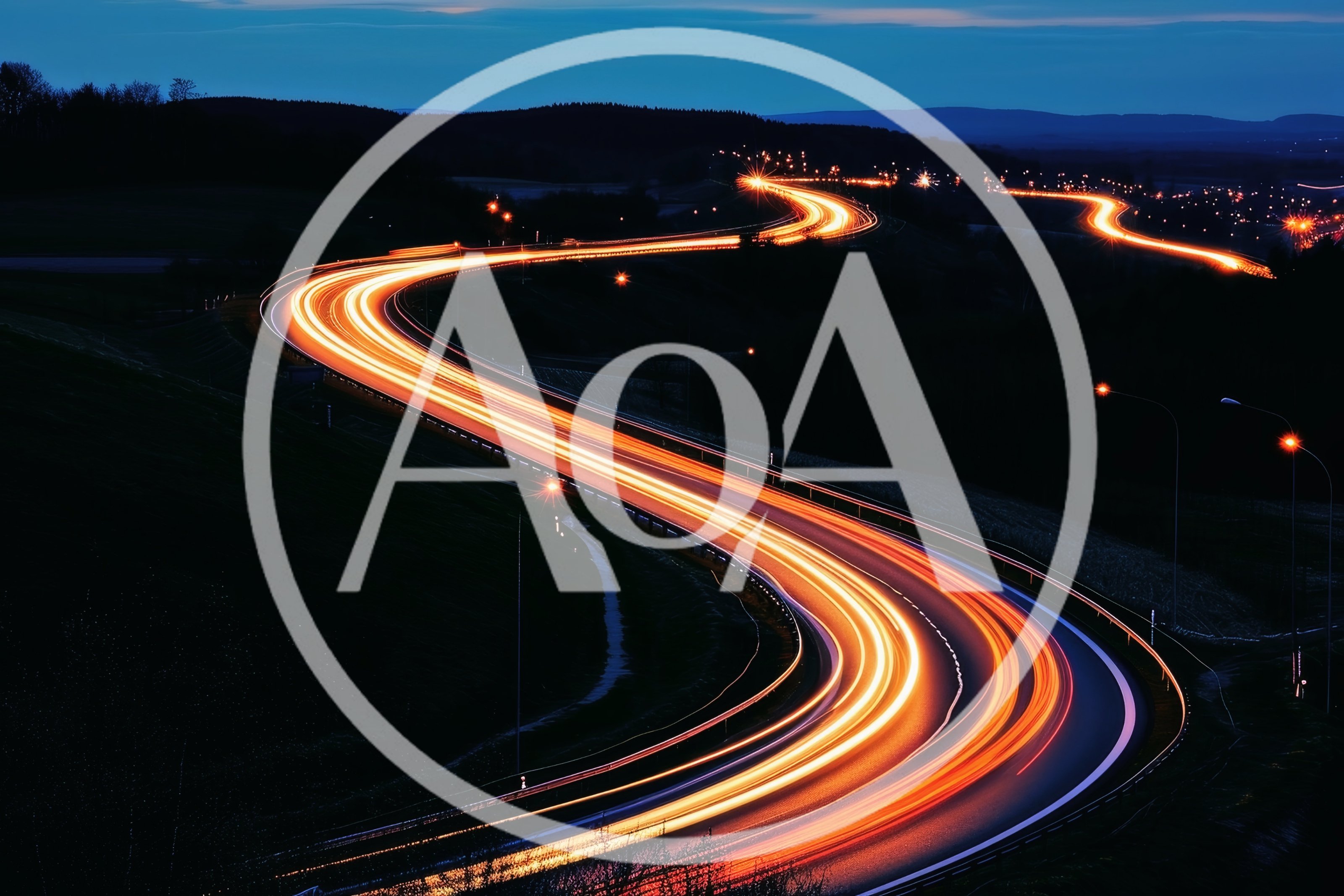 Long Exposure Light Trails On A Winding Highway