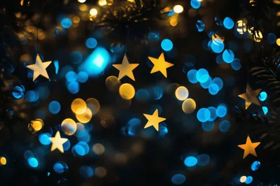 Hanging Decorative Stars With Bokeh Christmas Lights