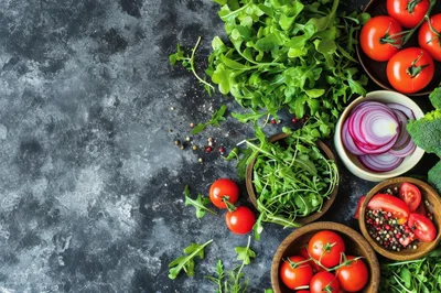 Fresh Vegetables and Herbs on Dark Rustic Background
