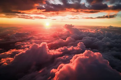 Aerial View Of Dramatic Sunset Above The Clouds
