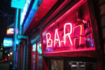 Neon Bar Sign Glowing At Night