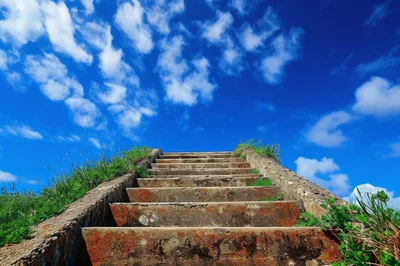 Old Concrete Stairs Leading Up To Blue Sky