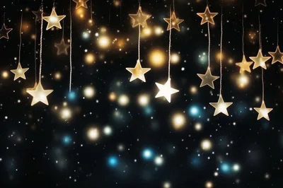 Hanging Glowing Star Decorations Against Dark Bokeh Background