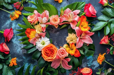 Heart Shaped Floral Arrangement On Dark Textured Background
