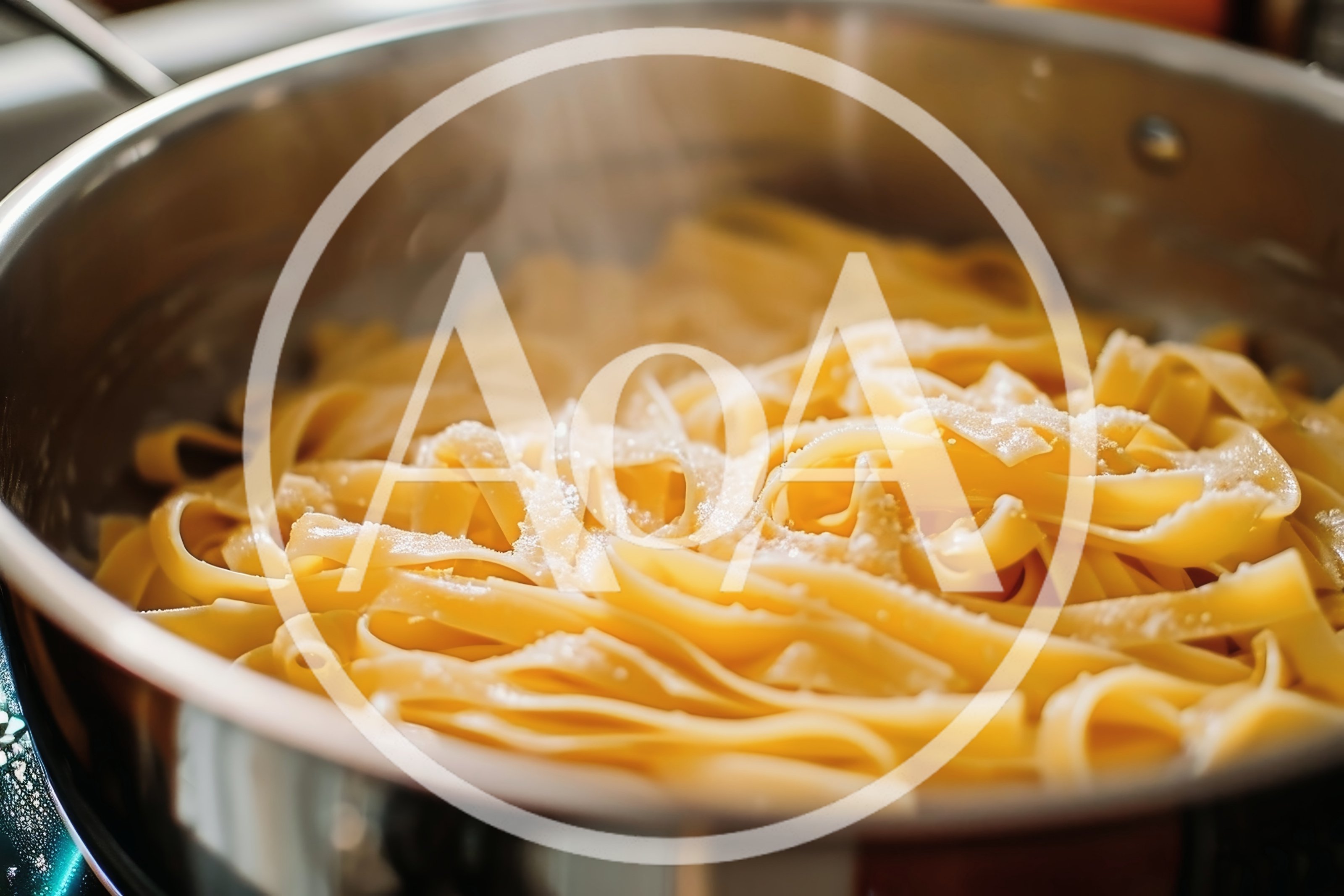 Steaming Fresh Fettuccine Pasta In A Stainless Steel Pan
