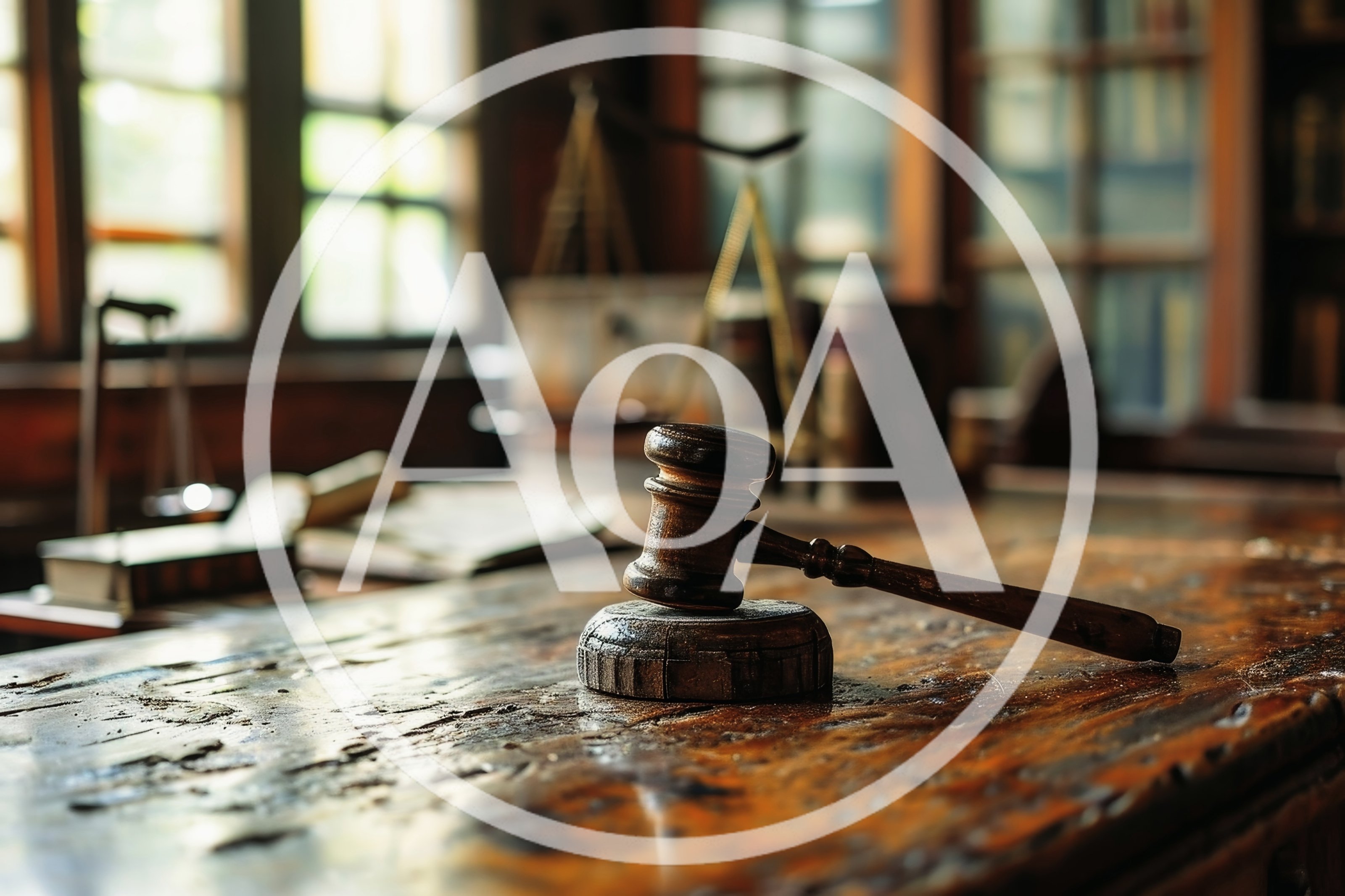 Wooden Judge Gavel Resting On A Desk