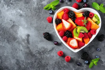 Heart Shaped Bowl Of Fresh Fruit Salad