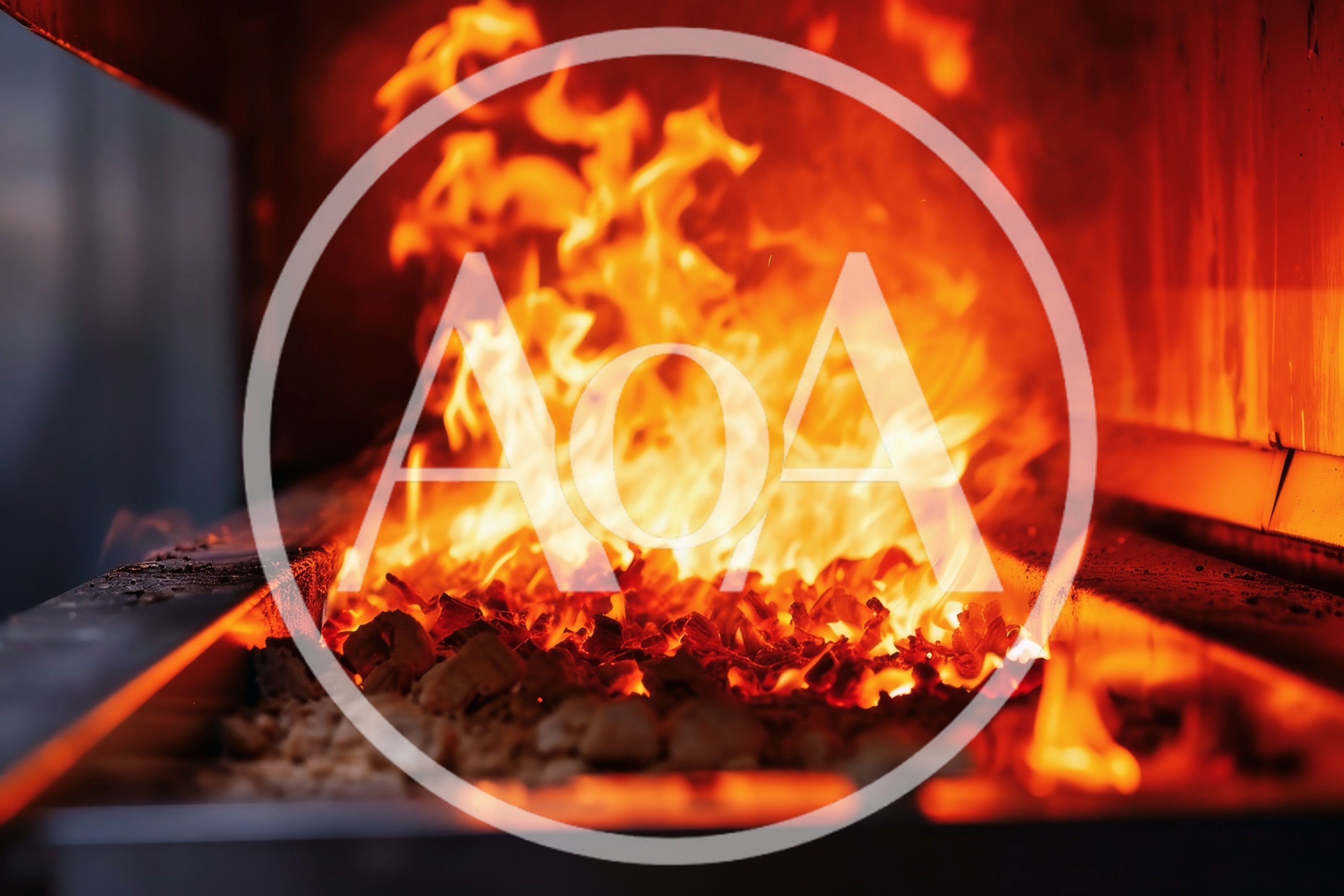 Intense Flames Burning In A Commercial Charcoal Grill