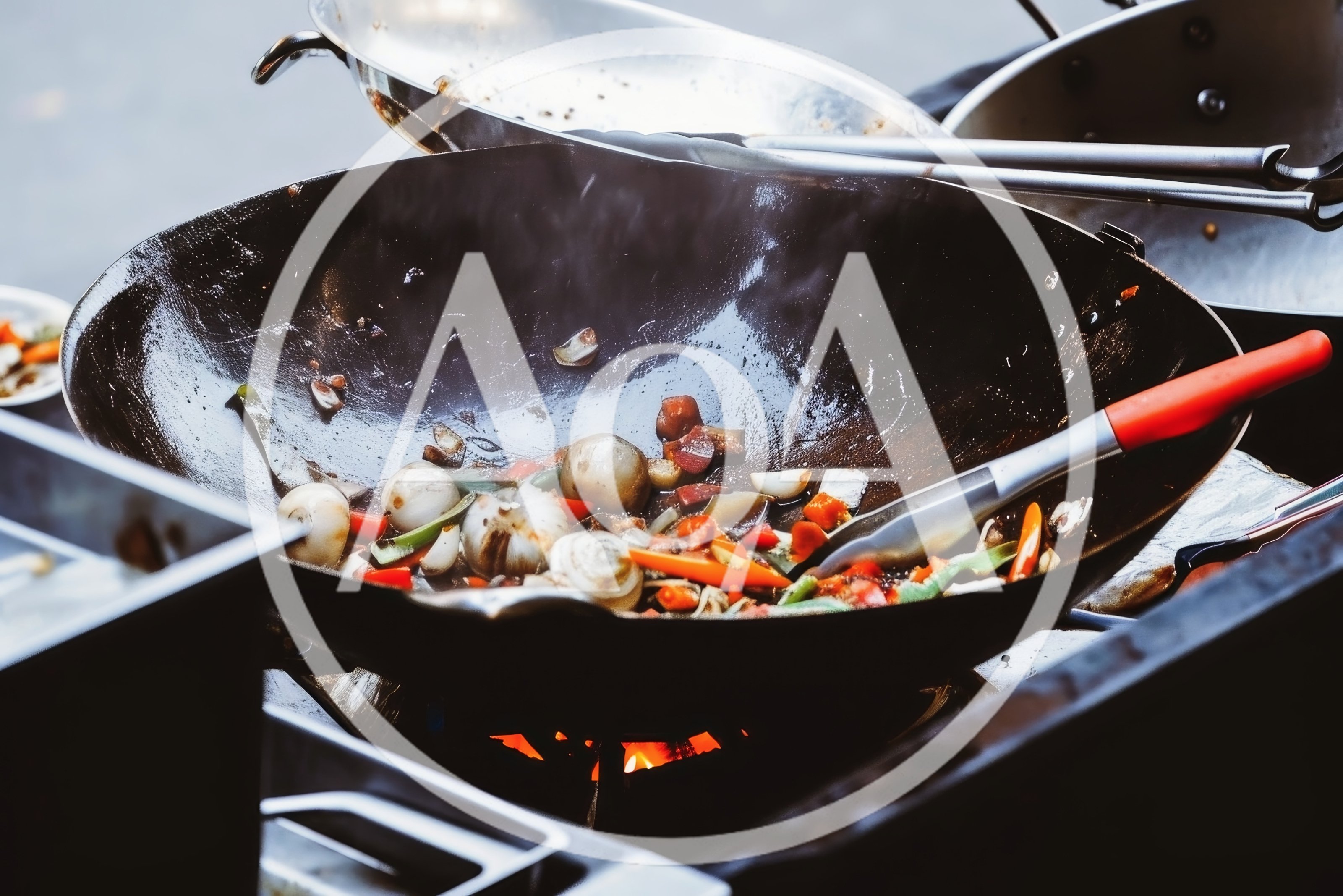 Stir Frying Vegetables In A Large Wok