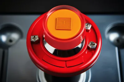 Close Up Of A Red Industrial Emergency Stop Button