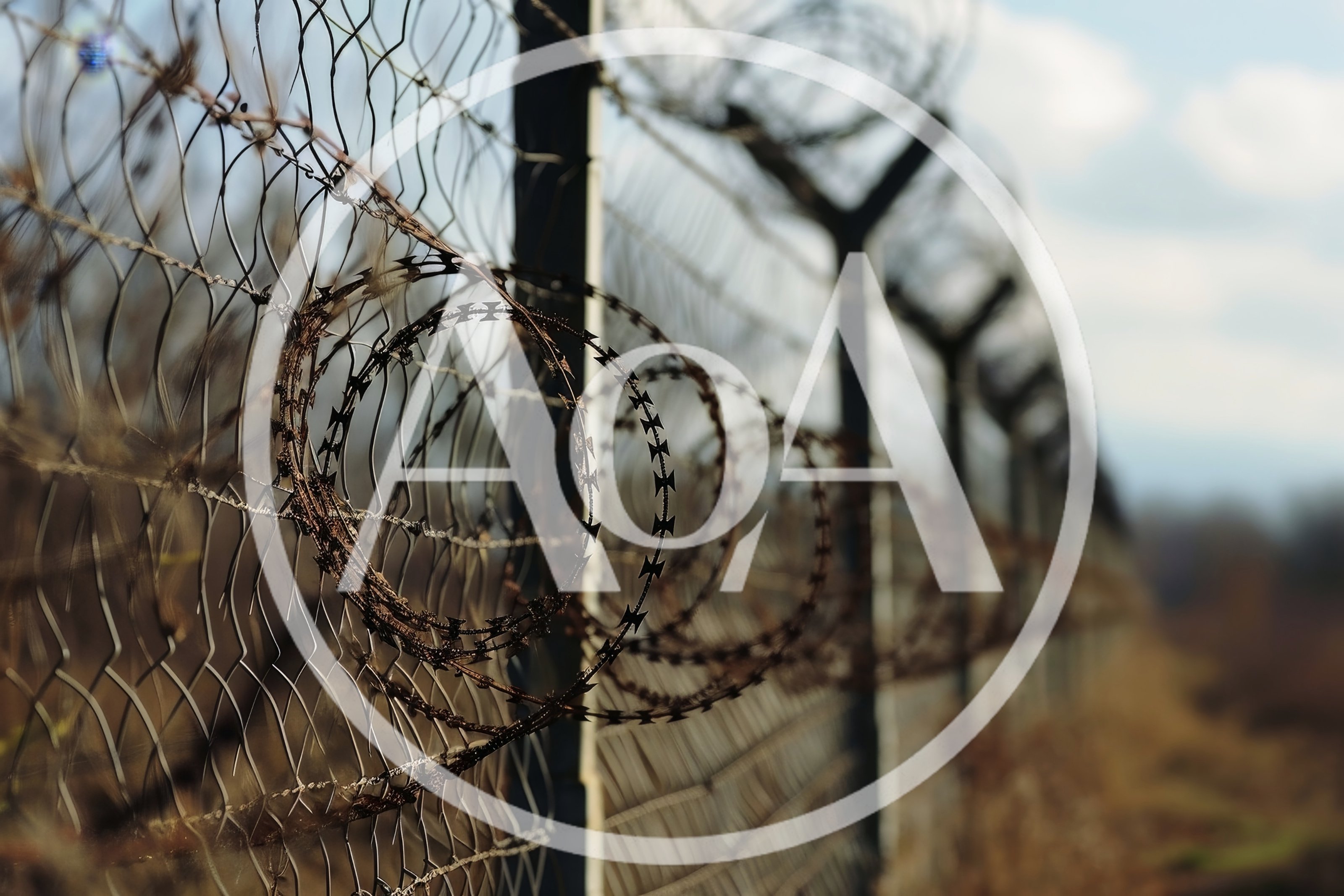 Razor Wire Fence Along A Border Perimeter