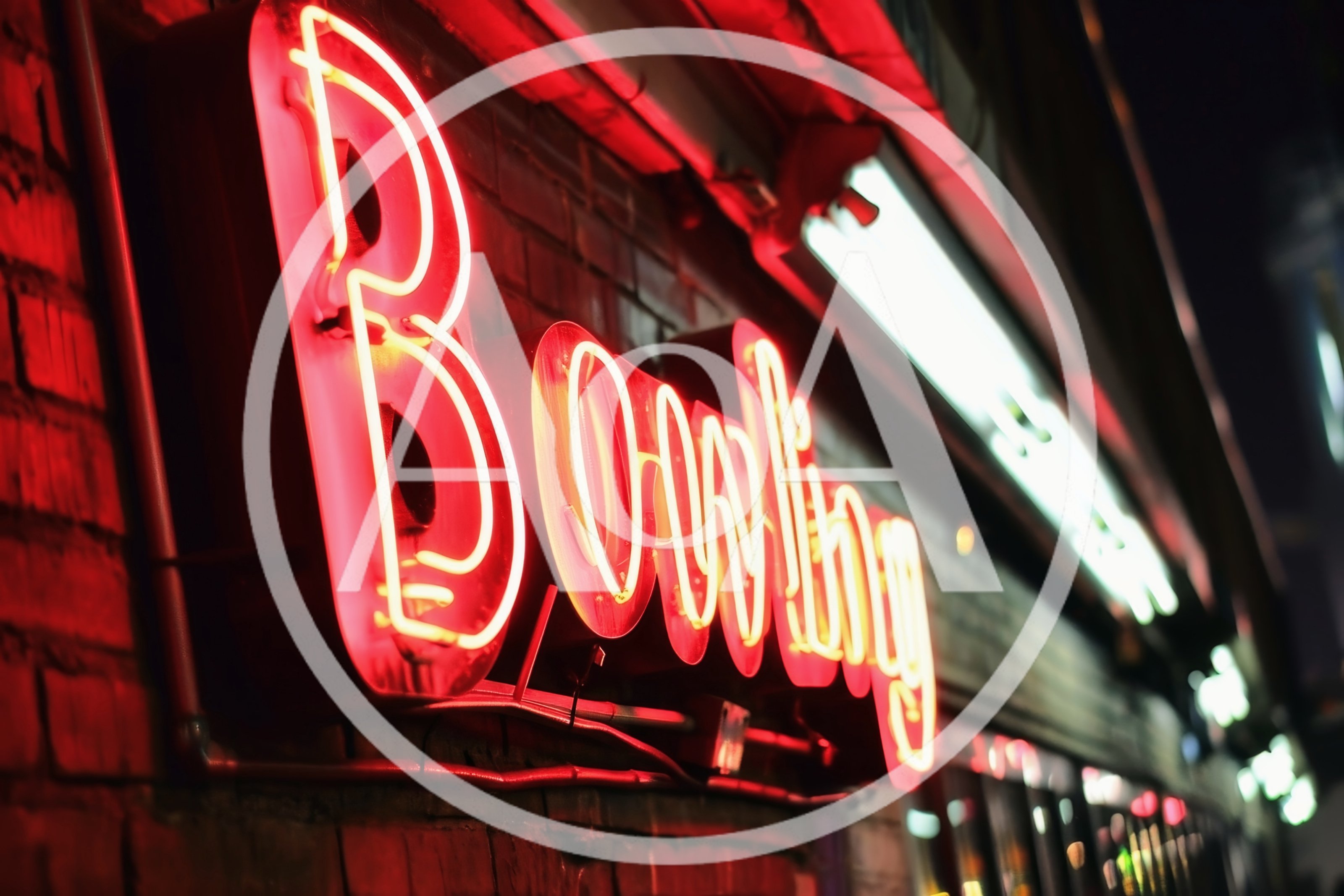 Glowing Neon Bowling Sign On A Brick Wall