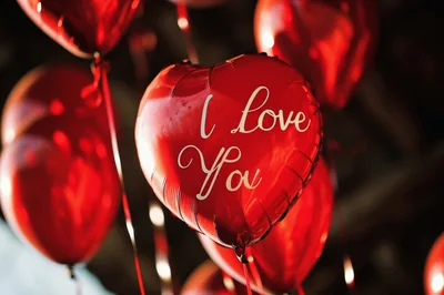 Red Heart Shaped Balloons With I Love You Text