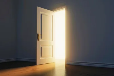 Open Door With Bright Light Shining Through