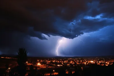 Lightning Strike Over A Suburban Town At Night