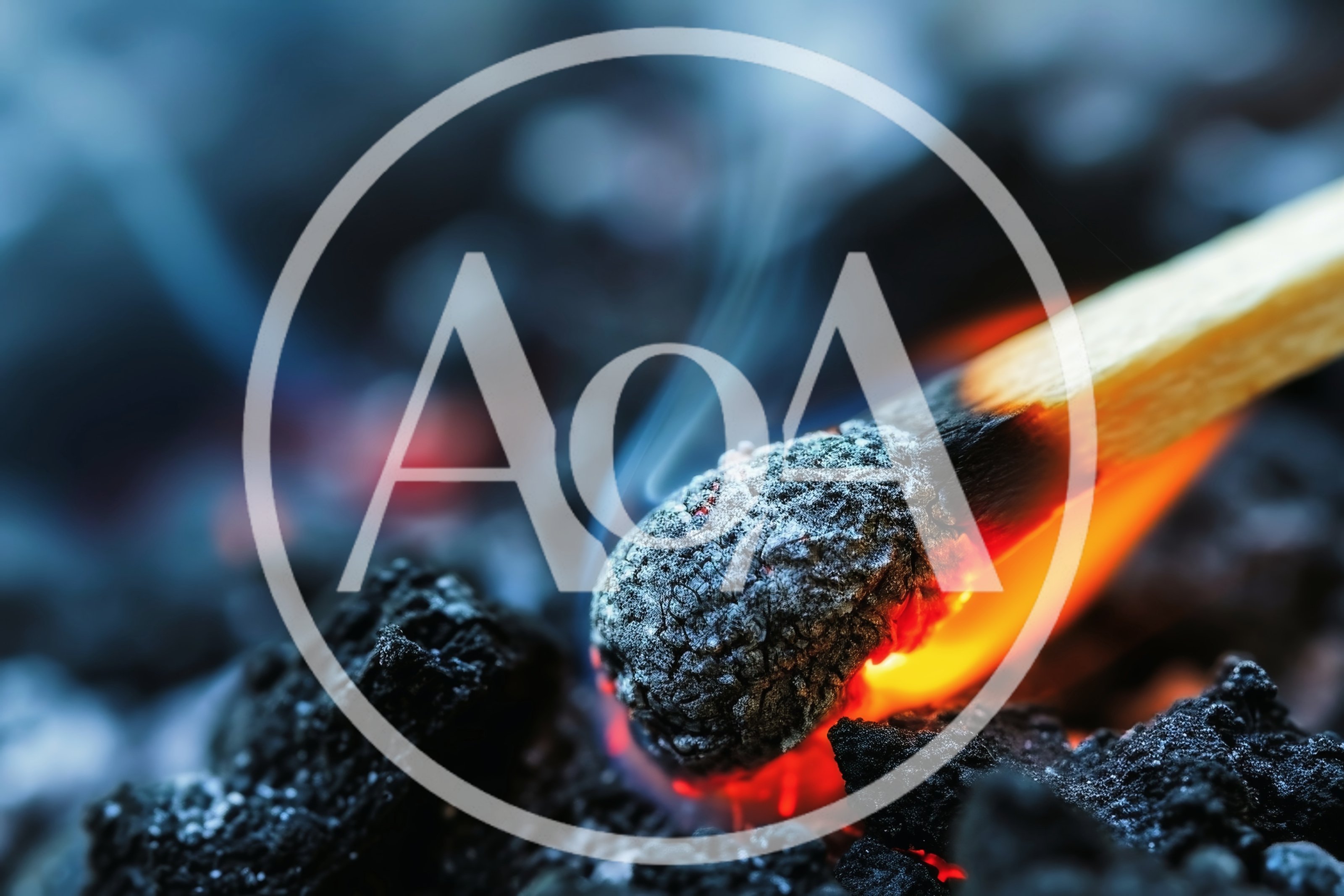 Burning Matchstick Resting On Glowing Charcoal Embers