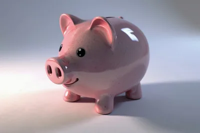 Pink Ceramic Piggy Bank On White Background