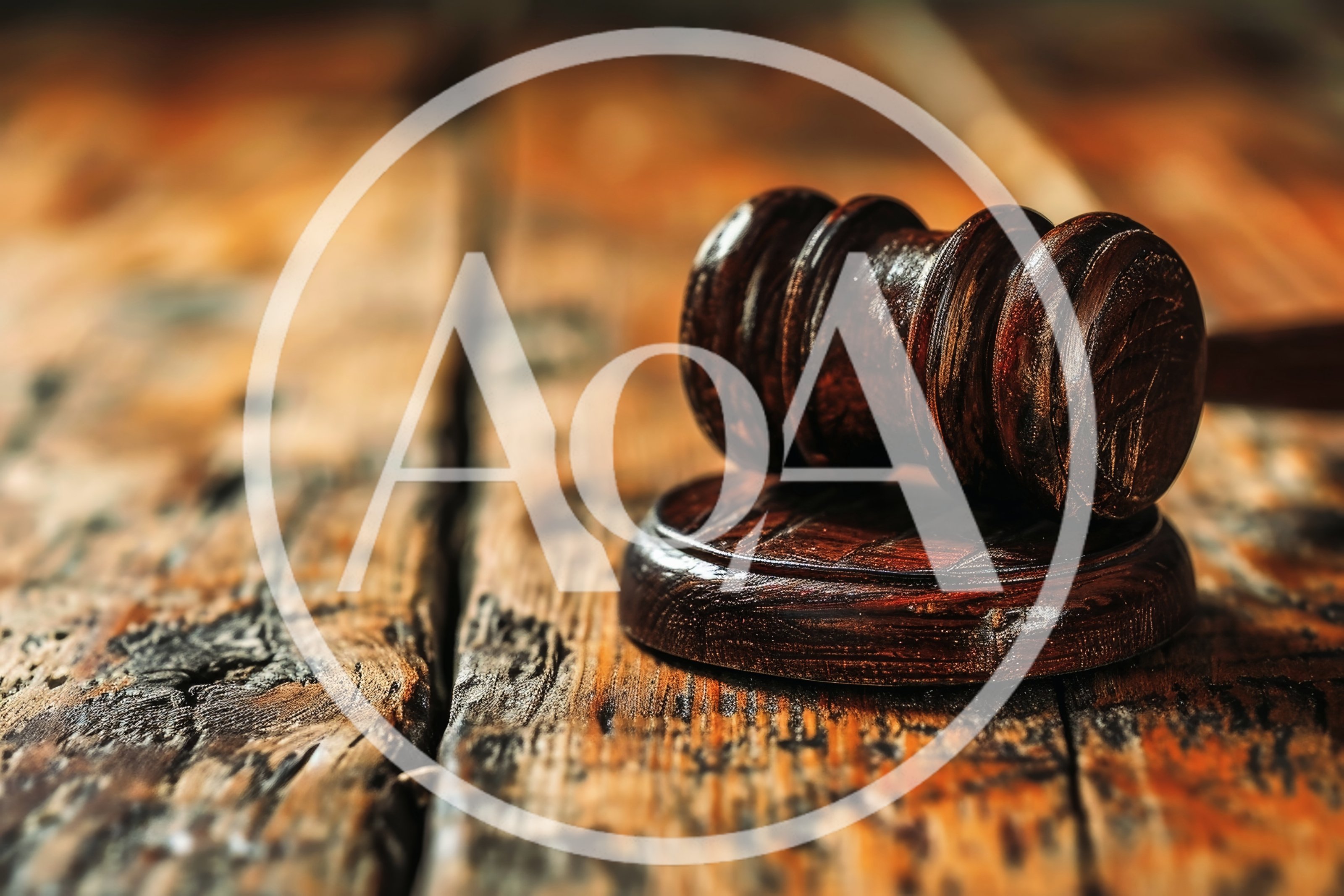 Wooden Judge Gavel Resting On A Rustic Table