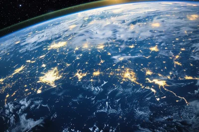 Earth From Space Showing City Lights At Night